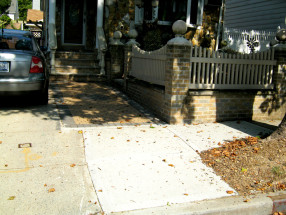 Completed sewer work finished cement and brick pavers