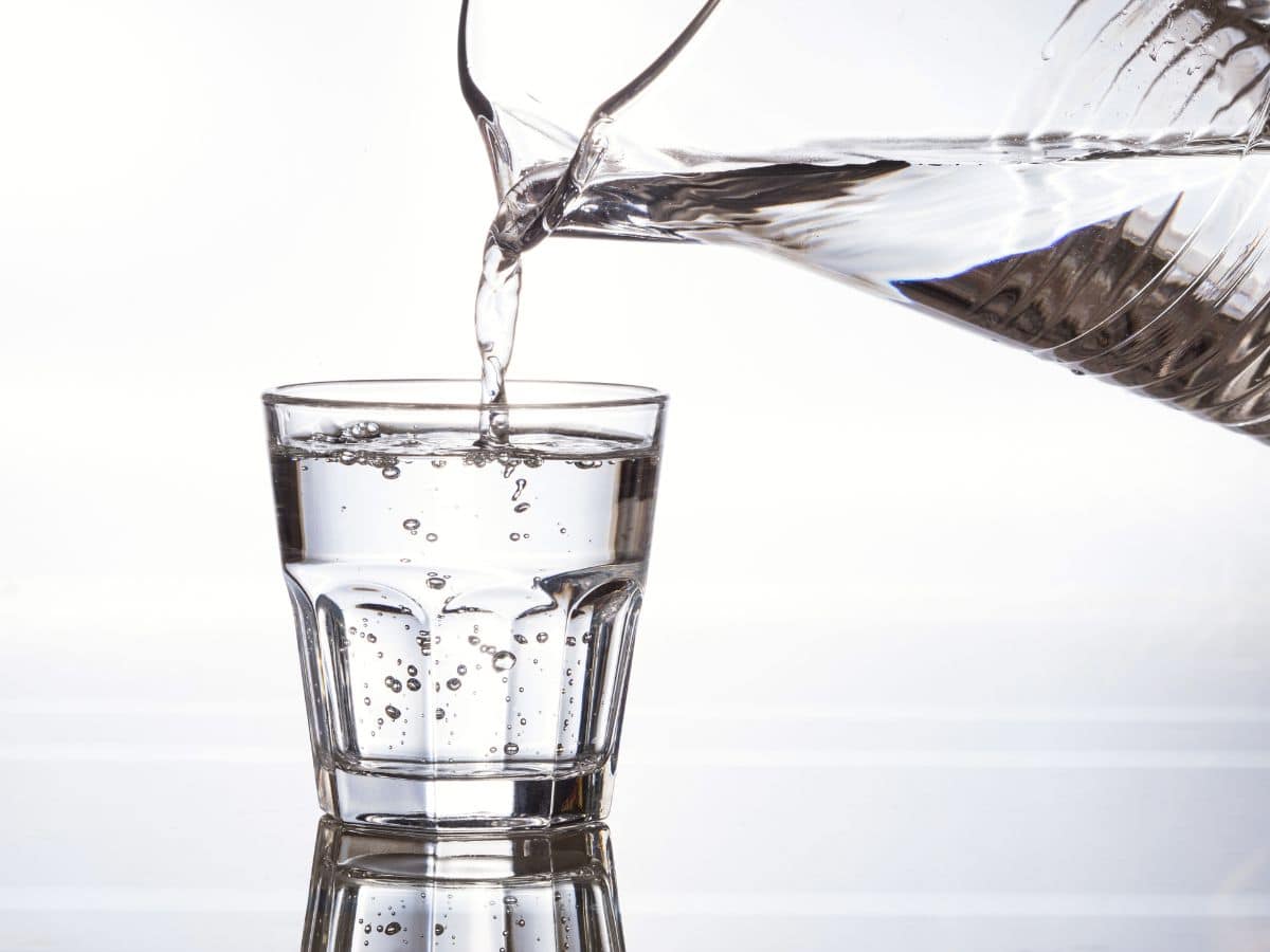 Galvanized Pipes Vs. Copper Pipes - What's the Difference? 3 a glass of water being poured into a glass