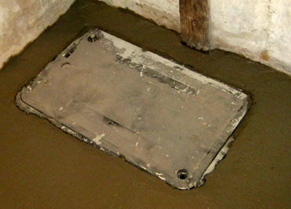 How To Find The Sewer Trap And Locate Your House Sewer 2 A sewer trap location is under the sewer access cover inside a basement