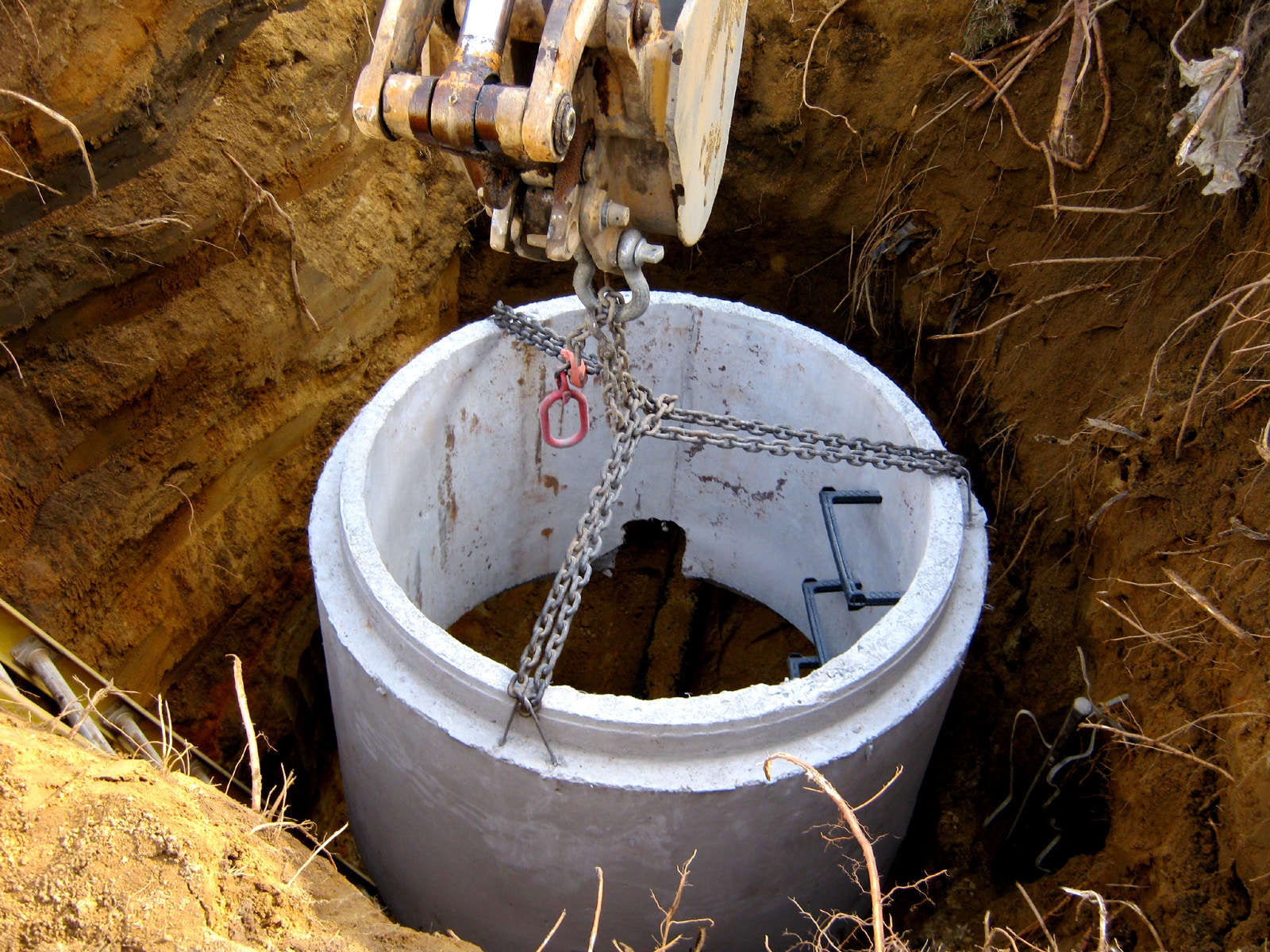 A New Manhole Connection For A House Sewer Explained a-new-manhole-connection-for-a-house-sewer-explained