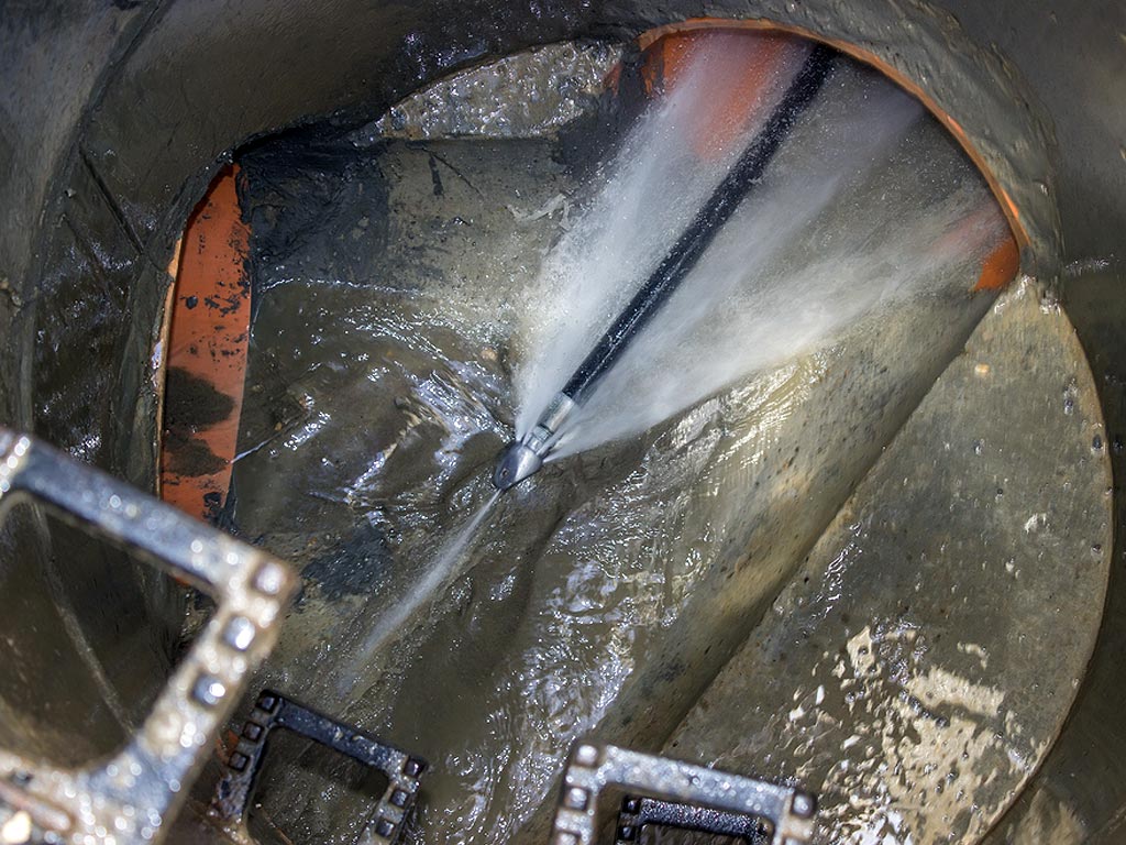 water jetting clears grease clogs