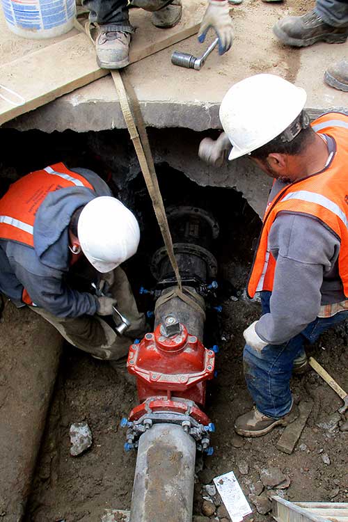 water main repair with valve, broken concrete